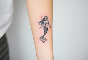 Realistic tattoo on forearm of a mermaid tattoo idea