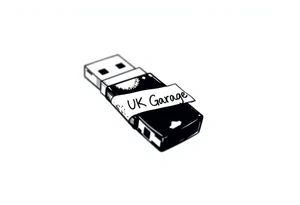 A usb drive with a little piece of sticky tape that says “UK Garage” tattoo idea