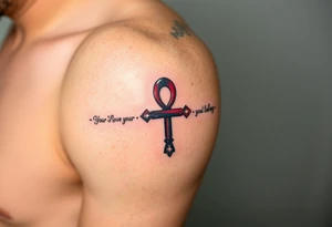 An Ankh with the Names of Your Loved Ones Written Along It(only red , blue and black are possible colors) tattoo idea