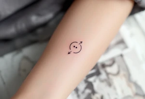 A comma with a dot above it, with an flowing arrow around tattoo idea