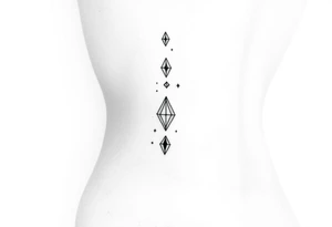 small dainty tattoos to add to spine tattoo idea