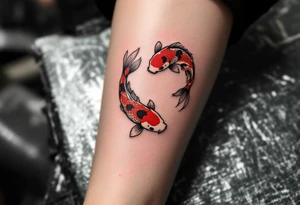Two red and black koi fish swimming in a circle, the first tattoo larger on the calf, and the second smaller on the ankle. tattoo idea