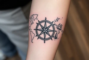 antique compass rose overlaid on weathered world map with sailing ships tattoo idea