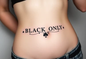 text reading "BLACK ONLY" across a womb tattoo decorated with spades tattoo idea