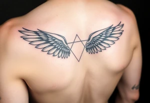 Simple Angle wings with Tiffany in the middle tattoo idea