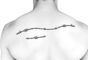 Barbwire wrapped around forearm tattoo idea