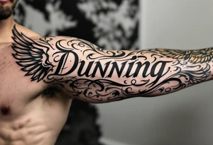 Dunning, left arm details include bold strong font, gold highlights, theme of wealth and angel wings, tattoo idea