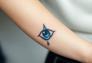 A tear drop dripping from the eye, glowing in silver and blue tattoo idea