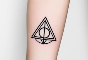 deathly hallows symbol from harry potter with a little illuminati tattoo idea