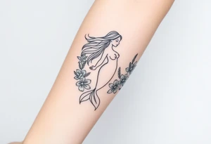 ethereal mermaid with flowing hair among coral and sea flowers tattoo idea