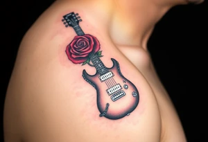 A detailed electric guitar with silver strings, draped in chains, with a rose blooming from the neck, symbolizing the power of love and music together tattoo idea