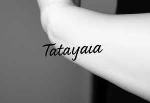 Tattoo for a man that says the name “Tatayana” tattoo idea