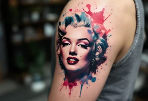 Watercolor Marilyn Monroe tattoo with splashes of red, pink, and blue around a classic black-lined face. tattoo idea