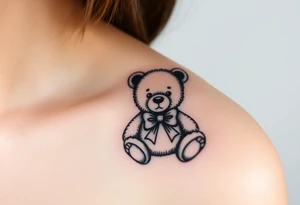 realistic teddy bear with a bow around its neck tattoo idea