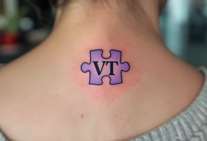 A puzzle piece in pastel purple with the daughter’s initials VT inside, symbolizing how she completes your heart. tattoo idea