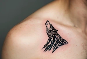 wolf on mountain howling at moon tattoo idea