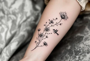 Wildflowers with bird tattoo idea