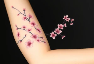 delicate cherry blossoms swirling in spring breeze with petals tattoo idea