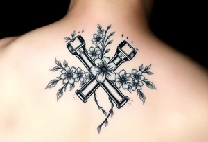 2 pistons crossed together with flowers and vines tattoo idea