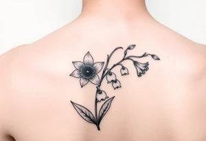 shoulder blade tattoo for women with daffodils, daisy, lily of the valley tattoo idea