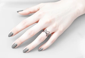 A thin, delicate ring tattoo tattoo idea
