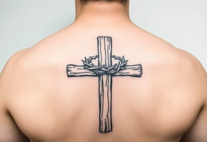 Wooden cross with a crown of thorns tattoo idea