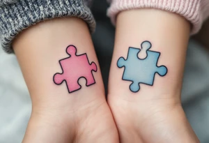 Interlocking puzzle pieces in soft pink and muted blue on the inner wrists symbolize how perfectly you fit together. tattoo idea