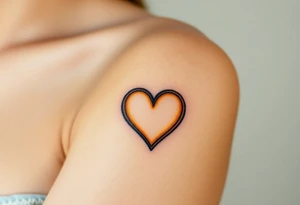 A lion paw with golden highlights and the heart tattoo idea