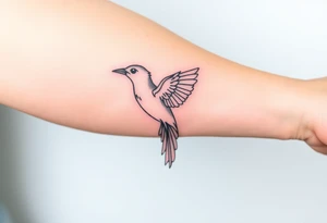 Feminine bird tattoo idea