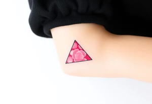 A watercoloured pink triangle (upsidedown), with very small black lining and upside down. Just the colour pink. No shapes. Just the colour pink filling the triangle and a small black outline tattoo idea