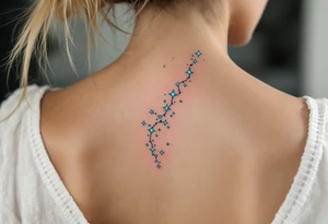 The Pisces constellation is dotted with tiny aquamarine stars that flow like water along the spine. tattoo idea
