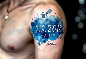 Bold numbers "21.9.2018 v 7:30" with the name "Jakub" beneath, surrounded by a blue watercolor splash. tattoo idea
