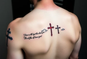 Red and black ink  tattoo on left inner arm with bible verse the background faint clouds and 3 crosses one red in the middle under a chosen wrist tattoo before the hand/palm tattoo idea