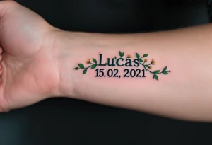 Luky 15. 02. 2021 – Deep emerald green vine twisting around Lucas's birthdate, with small yellow blooms dotting the numbers. tattoo idea