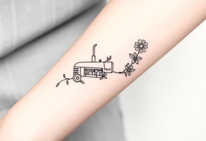 A feminine tractor with flowers tattoo idea