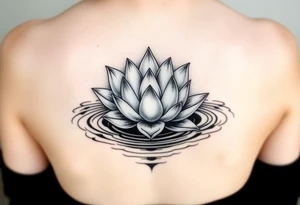 serene lotus flower emerging from sacred waters with ripples tattoo idea