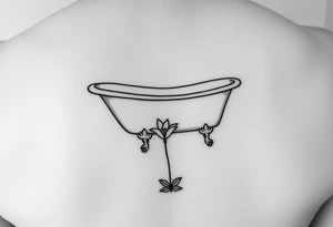 Clawfoot bathtub on tile floor with lily growing out of floor tattoo idea