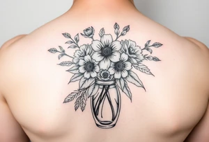 March, April, may, June, August, December flowers in a vase tattoo idea