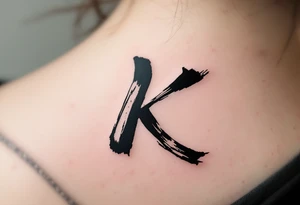Brushstroke K painted with bold black ink, Japanese sumi-e style with subtle red stamp mark in the corner. tattoo idea