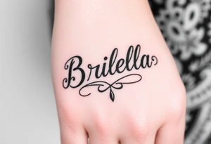 "Briella" in gangsterfont on hand along thumb tattoo idea