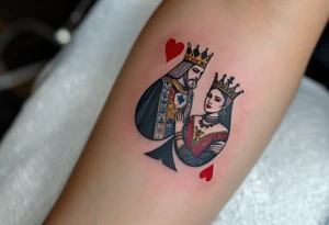Two playing card symbols—King of Spades and Queen of Hearts—done in black, red, and subtle shading. tattoo idea