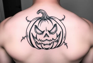 Spooky carved pumpkin 
With sad evil tattoo idea