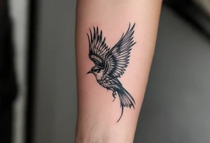 Feminine bird tattoo idea