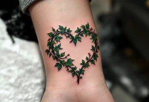 A heart shaped from leafy vines in forest green, wrapping gently around Barunka. tattoo idea