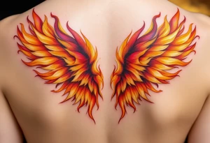 A pair of wings made from fire flames, transitioning from deep red at the base to golden yellow at the tips, symbolizing strength and courage. tattoo idea