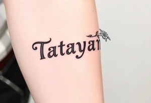 Tatayana name tattoo for a father using old English lettering and roses that starts reading from the wrist to the elbow tattoo idea