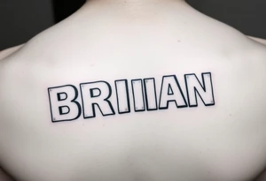 THE NAME "BRIAN" WITH EACH INDIVIDUAL LETTER WRITTEN ON BABY BLOCKS THAT ARE STACKED ON TOP OF ONE ANOTHER IN A STAGGARED POSITION tattoo idea
