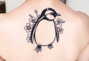 Cute penguin with flowers in the background tattoo idea