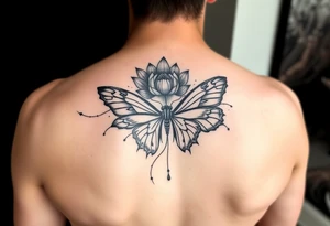 Elegant spine tattoo with lotus flower and butterfly with cracked wings mid back down tattoo idea