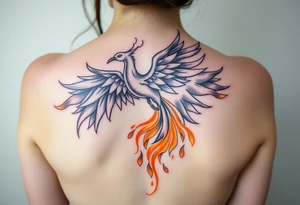 magnificent phoenix rising from golden flames with trailing embers tattoo idea